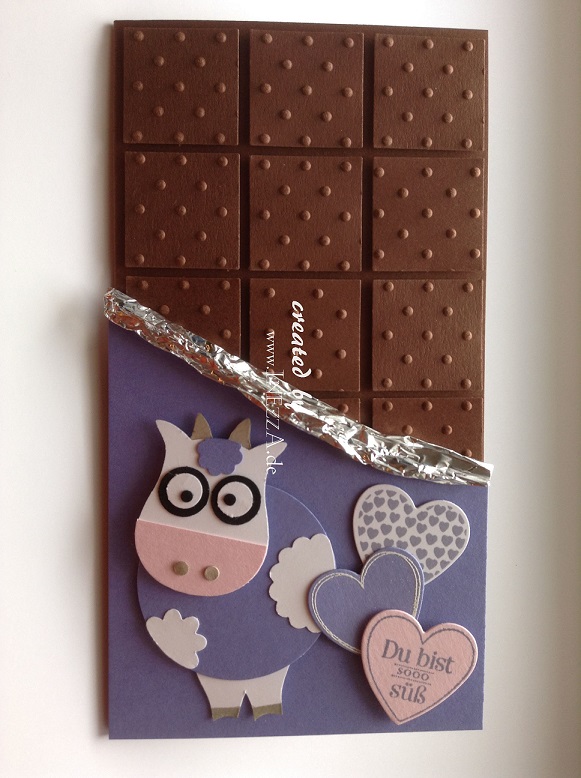 Glückwunschkarte in Form einer Schokoladentafel mit Kuh und Herzen