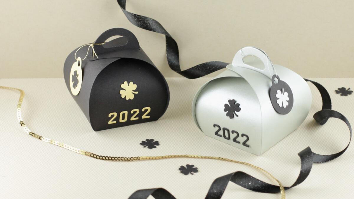 Runde Geschenkbox Kollektion 2022 in Schwarz-Gold und Schwarz-Silber